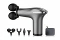Massage gun with attachments on a white background